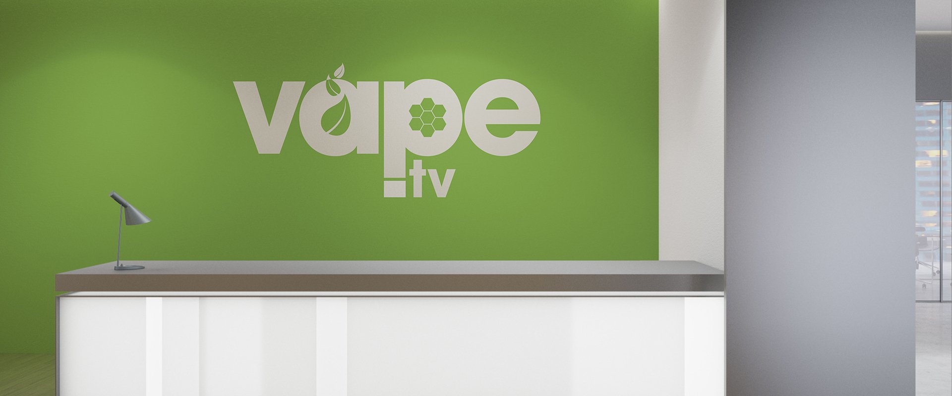 Branded office wall with green background taken from original logo colours.